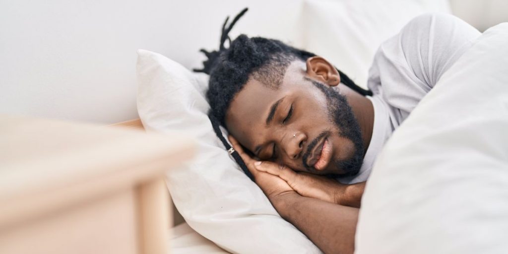 Athlete sleeping during overnight recovery after endurance training