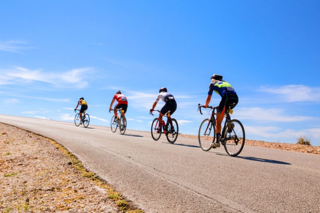 bikers race uphill in autumn ioannina city greece