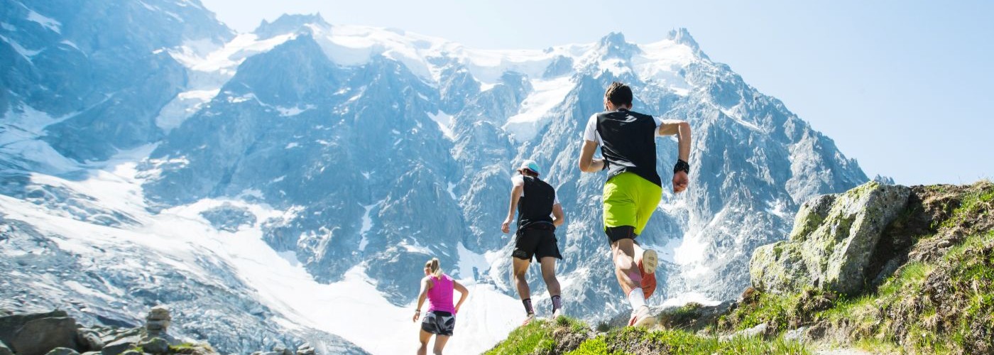 Trail runners training in the mountains illustrating endurance preparation with sustained energy